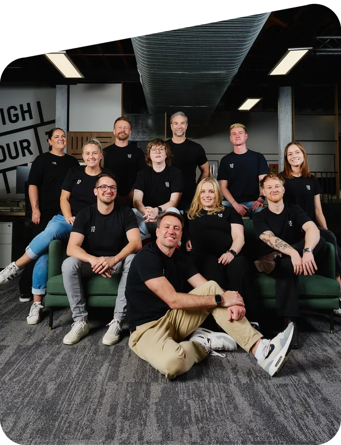 The Neighbourhood team together on the couch in the Brisbane office