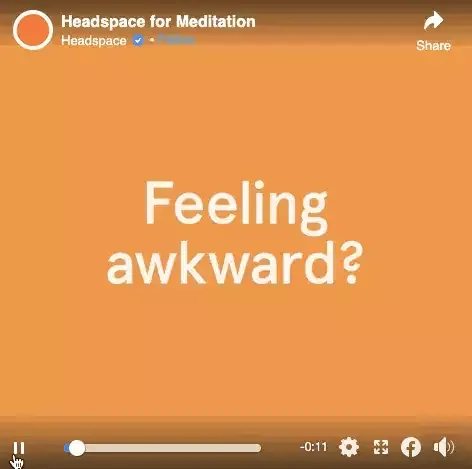 A Headspace video ad paused in the feed on the words Feeling awkward