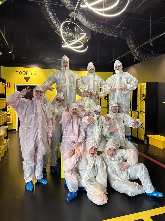 The whole crew in white paint suits before a 123boom session